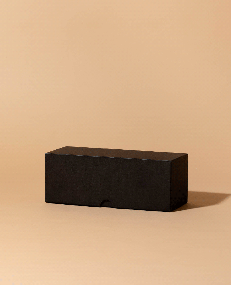 Black linen candle box, closed with pull-tab cutout