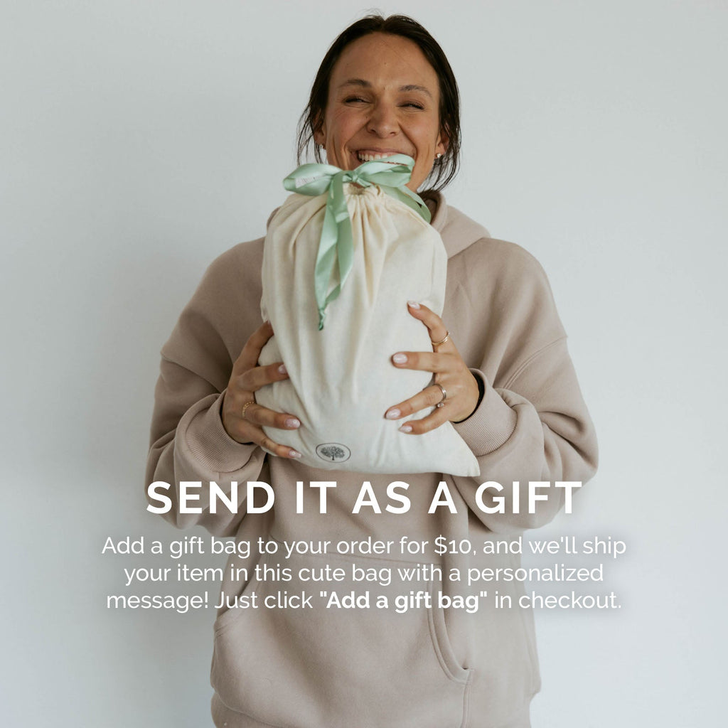 Muslin quilt held close with teal-green bow tie on edge