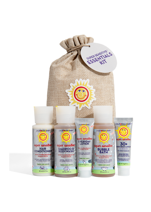 Fragrance-free essentials kit with tan drawstring pouch and assorted personal care bottles