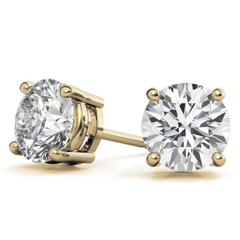 Round lab-grown diamond stud earrings with four-prong settings in yellow gold