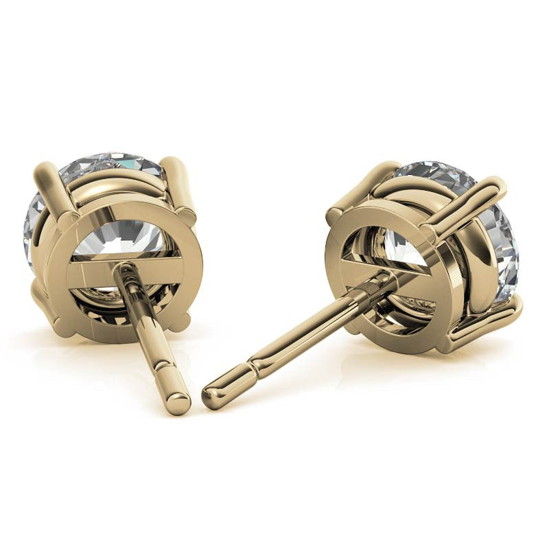 Round lab-grown diamond stud earrings with four-prong settings in yellow gold