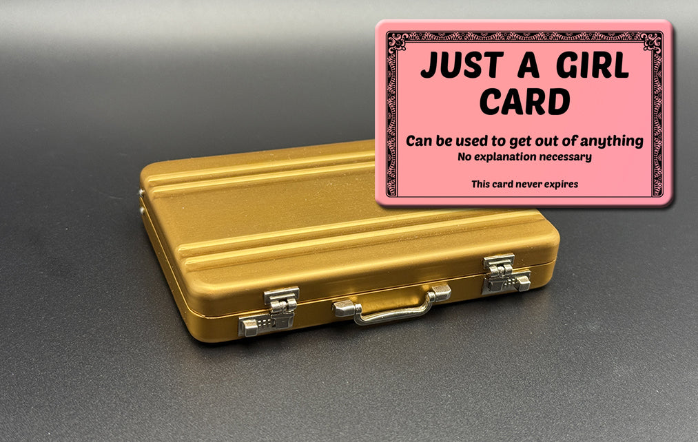 Mini briefcase, pink metal case with Just a Girl card overlay