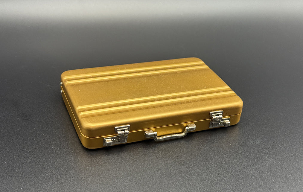 Mini briefcase, gold metal case with latch and top handle