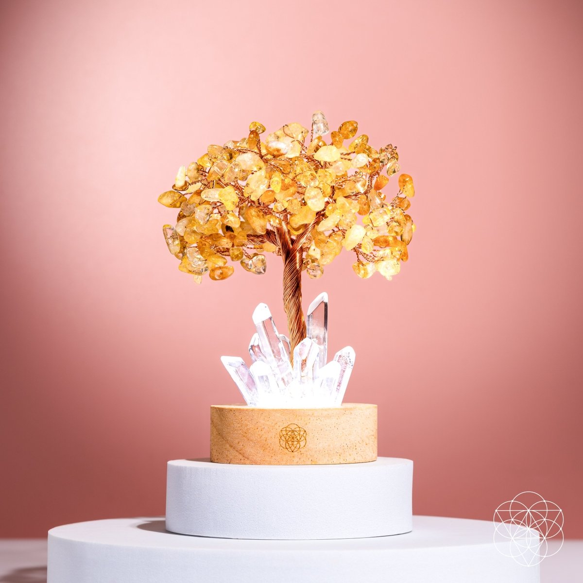 Citrine crystal tree lamp on white pedestal stand with clear quartz clusters