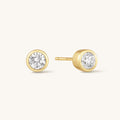 Gold round diamond bezel stud earrings with circular halo and straight posts