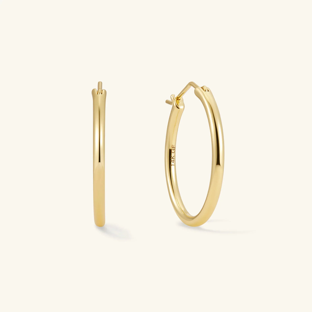 Gold hoop earrings pair, slim rounded hoops with clasp backs