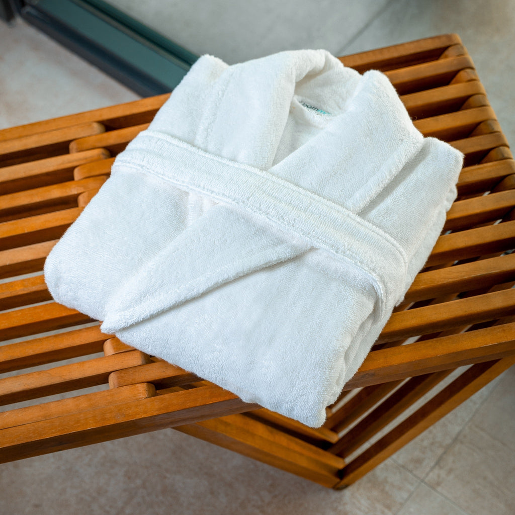 Light blue terry bathrobe, folded with belt tie and wide sleeves