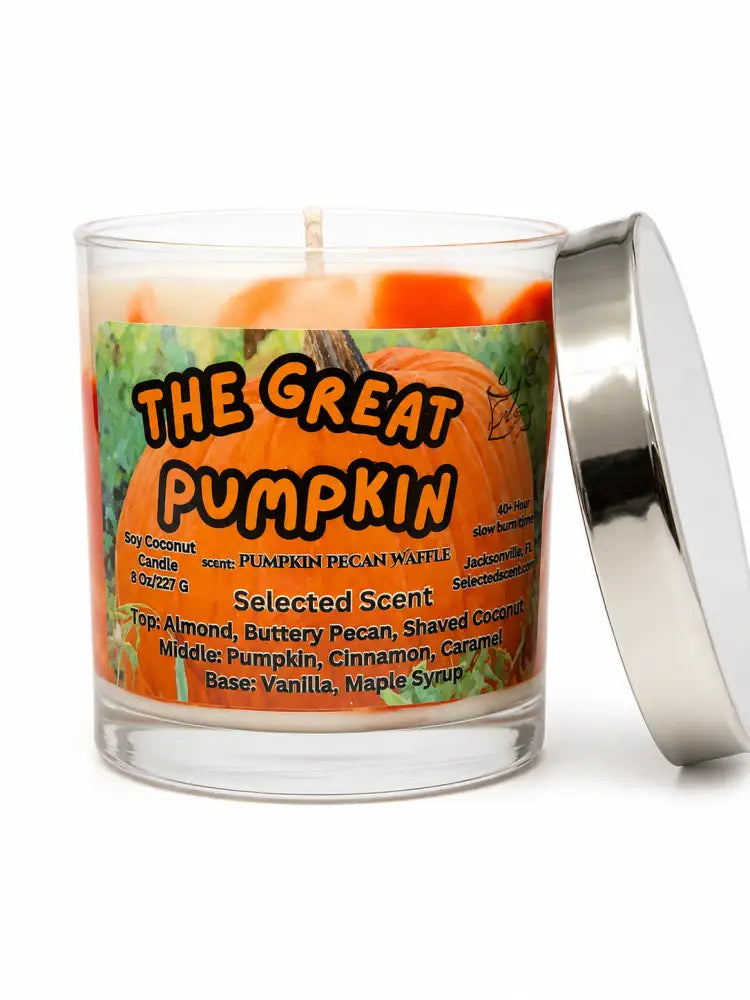 Marbled 8 oz pumpkin-scented candle in clear glass jar with metal lid, flame