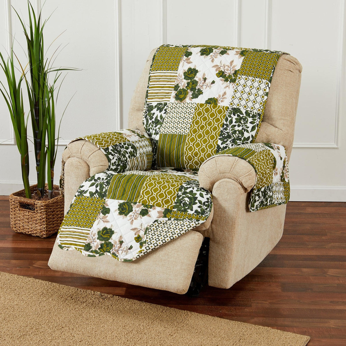 Reversible armchair protector with green and yellow patchwork quilted panels and stripes
