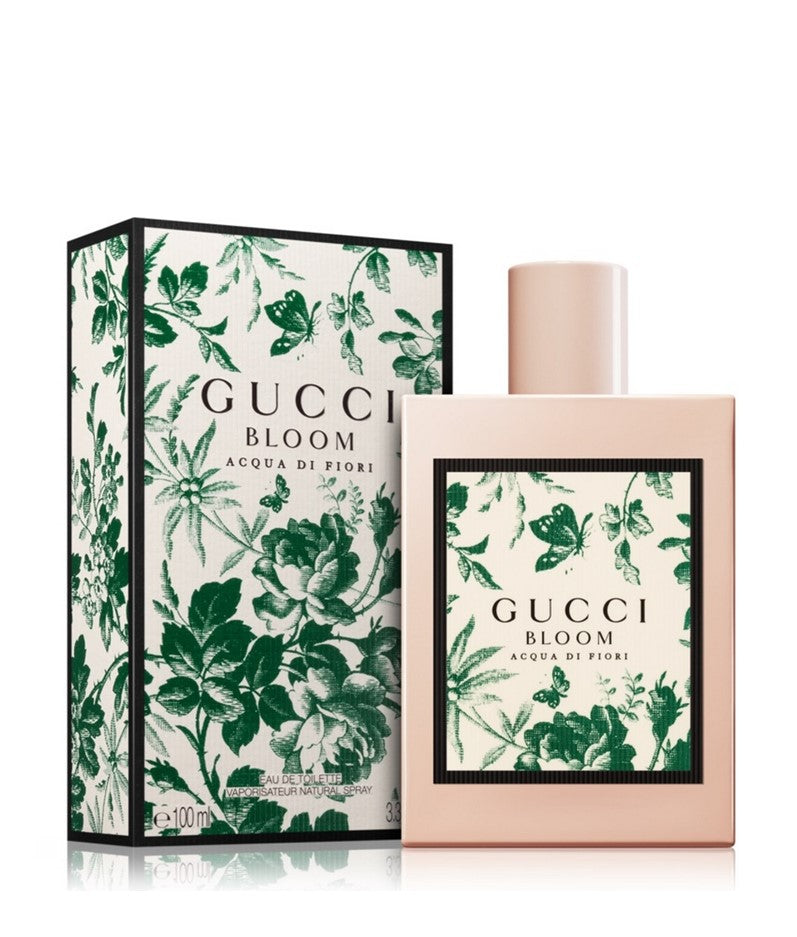 Perfume bottle and box set, pink bottle with Gucci Bloom green floral label