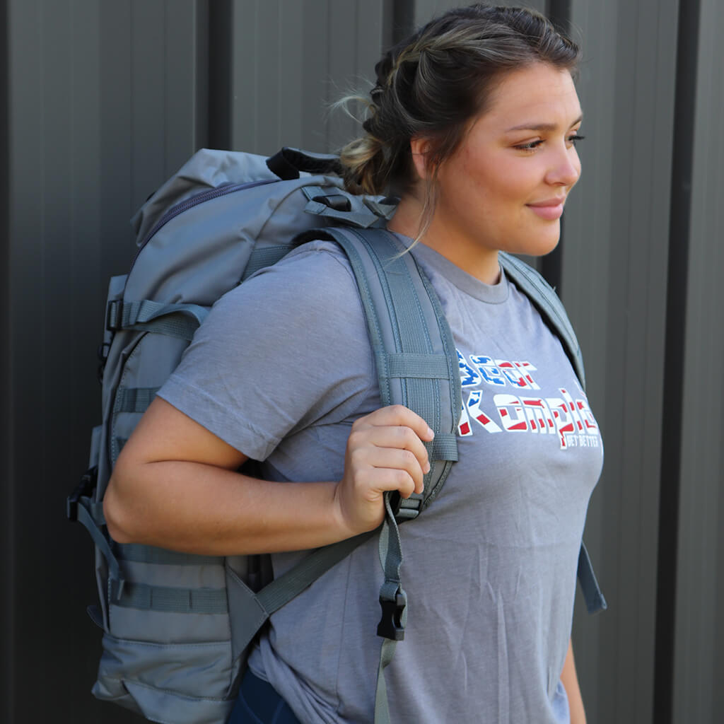 Light gray military backpack with front organizer panel and adjustable shoulder straps