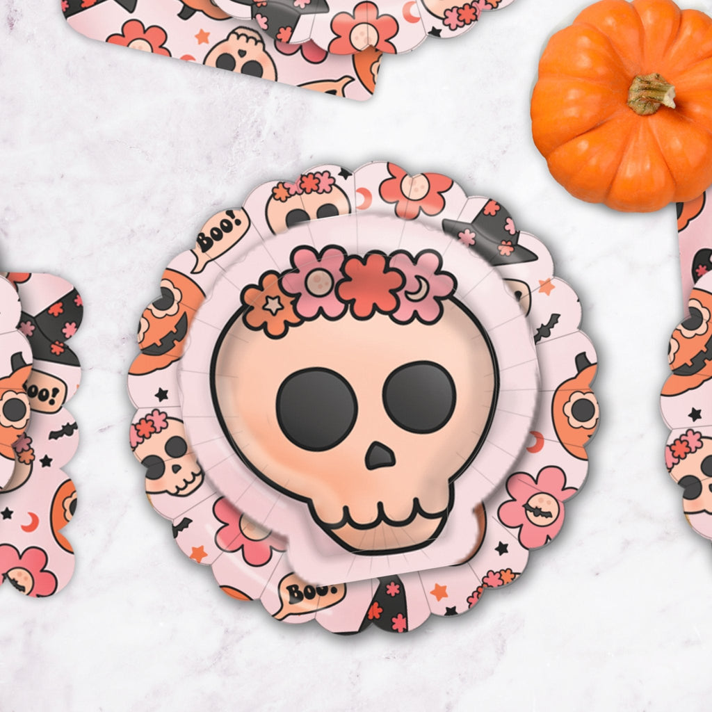 Groovy Halloween icon plates close-up, round skull-face design with flowers and stars