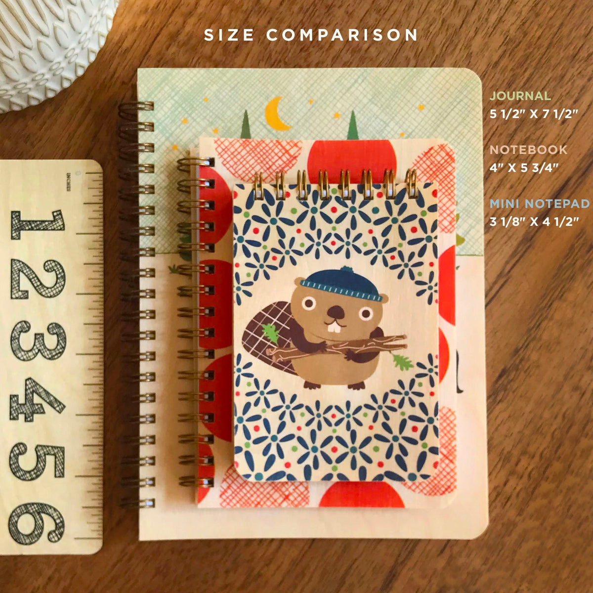 Mini notepad with colorful animal scene cover, spiral wire binding