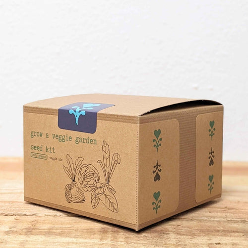 Leafy greens seed kit cardboard box with blue logo and plant line art
