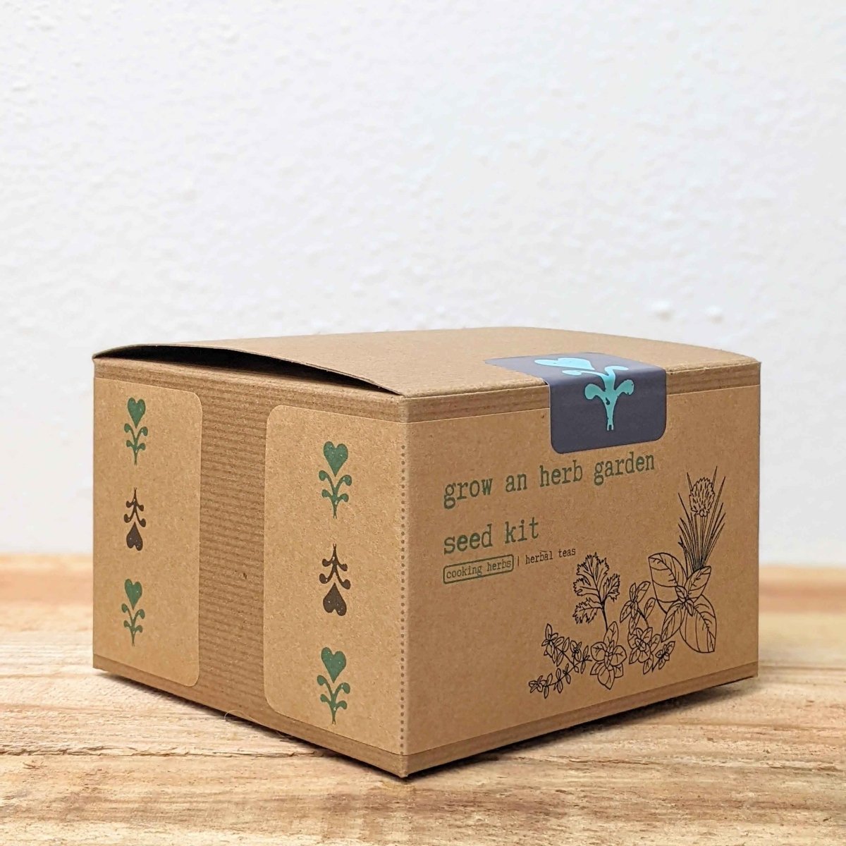 Herb seed kit cardboard box with side icons and grow an herb garden graphics