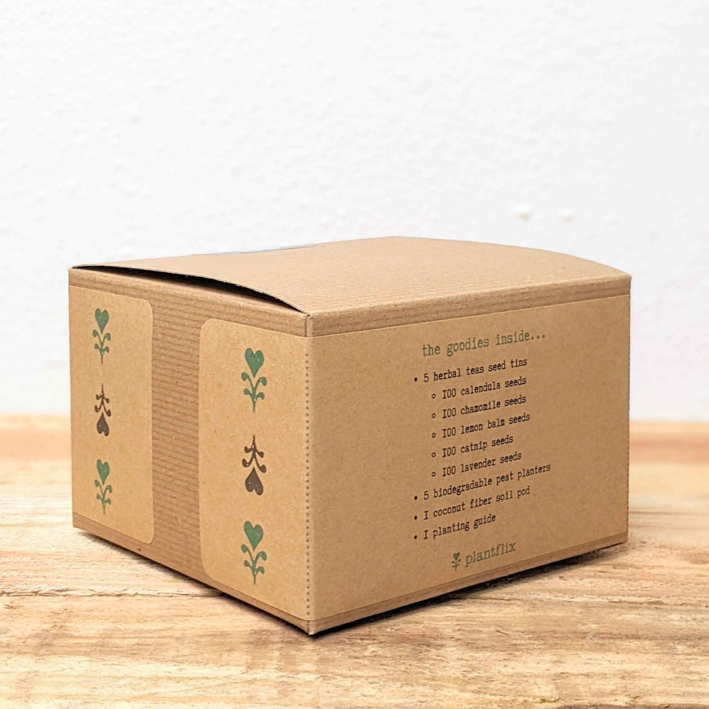 Herb garden seed kit box showing side leaf pattern and list of contents