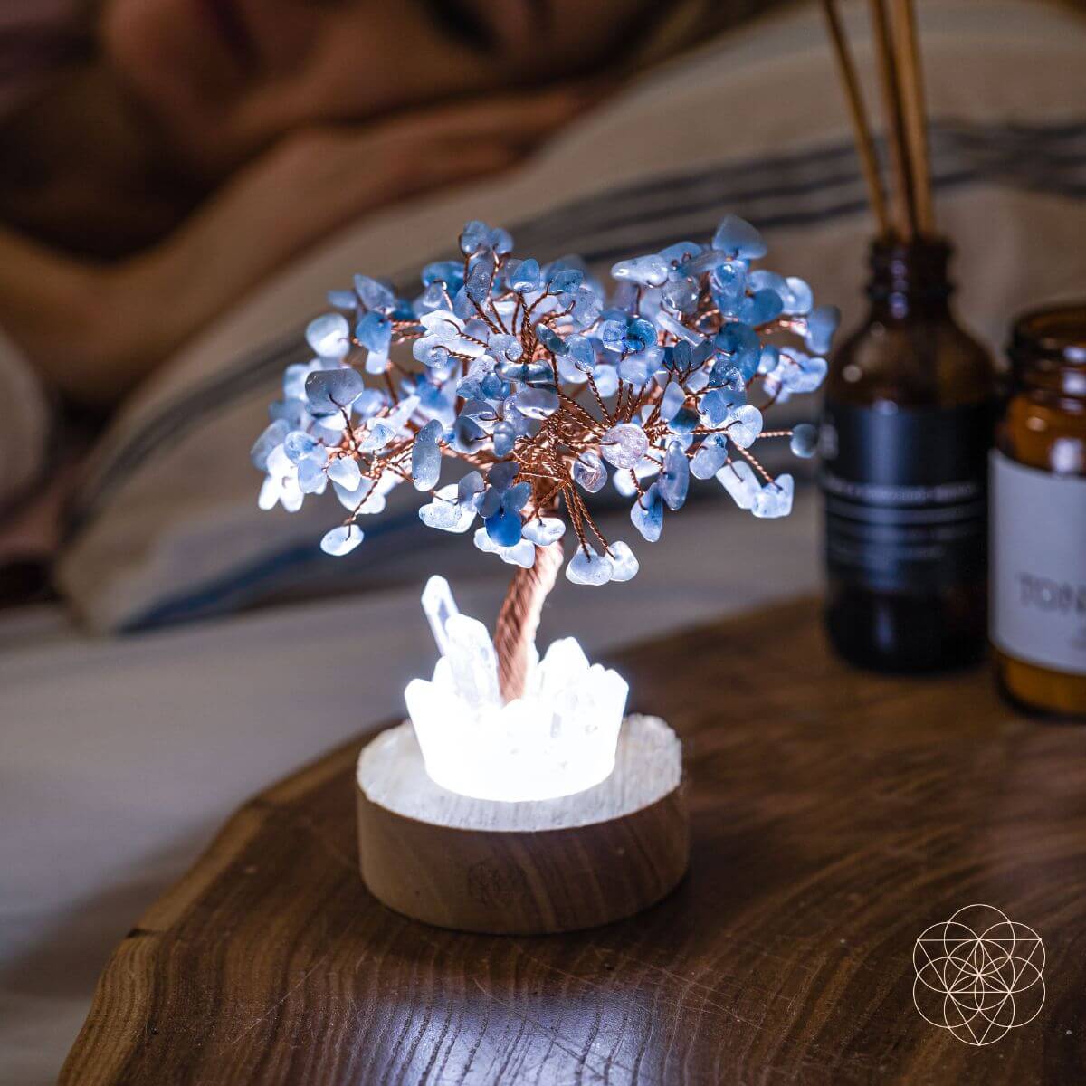 Blue crystal tree lamp with glowing crystal clusters and white crystals on wood base