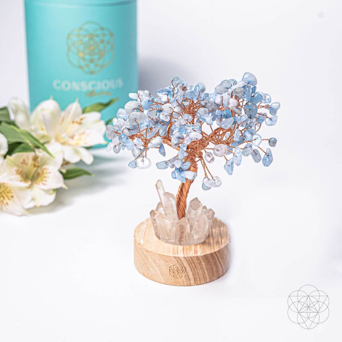 Blue aquamarine crystal tree lamp with white clear crystals on round wooden base