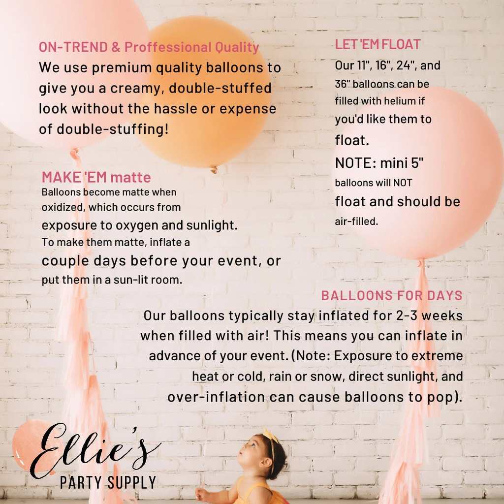 Pastel peach balloon garland with light pink hanging ribbon streamers