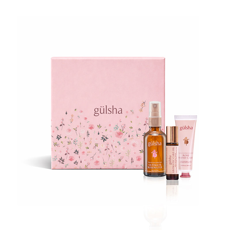 Gulsha Rose Ritual skincare trio with pink gift box, mist, serum, and cream
