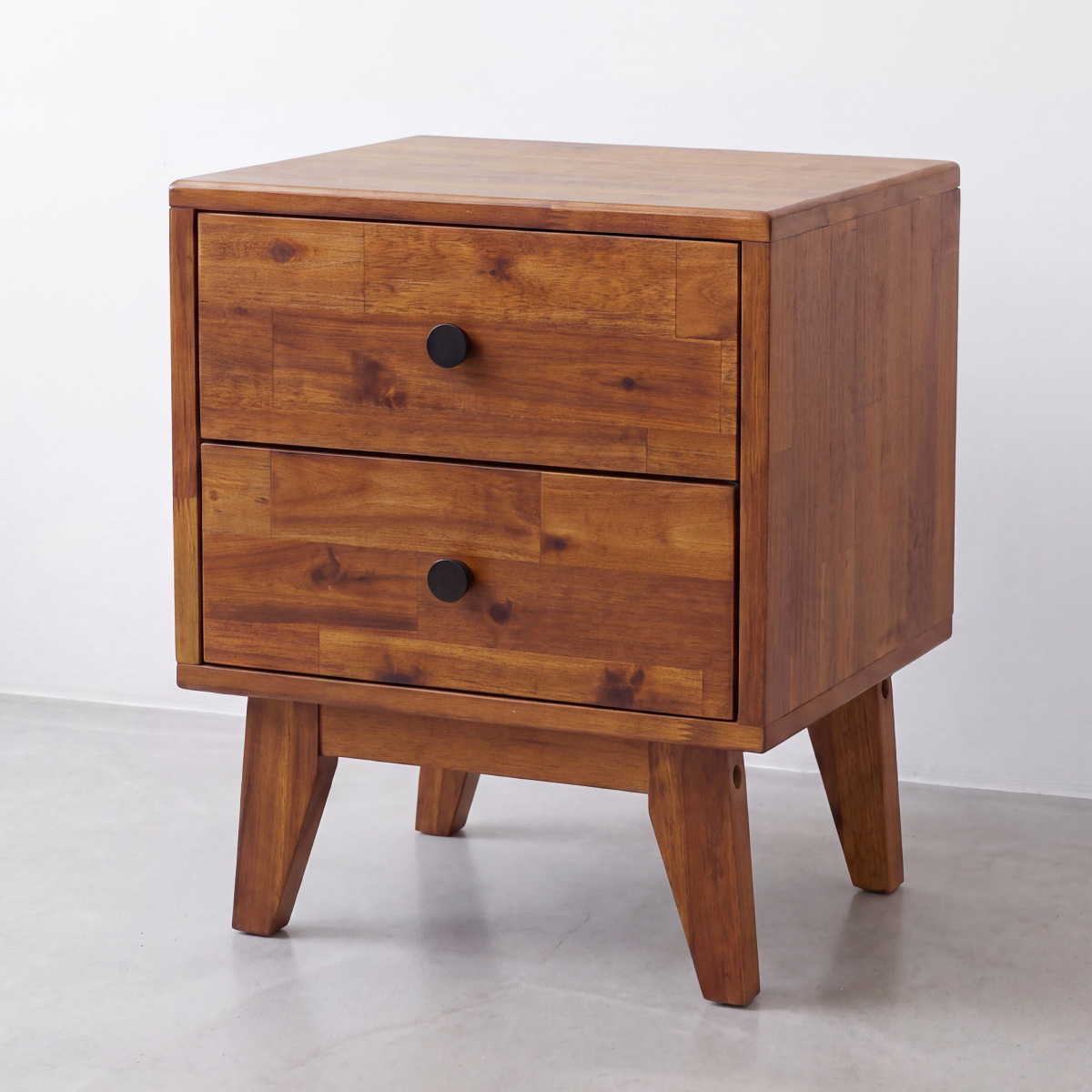 Silvia solid wood nightstand with two drawers and round black knobs, front view