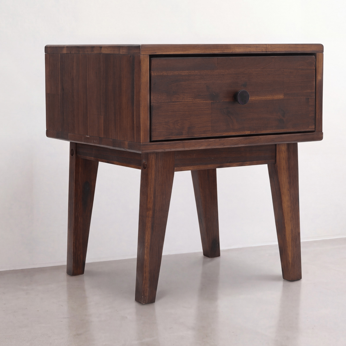 Solid wood nightstand with front drawer and round knob, tapered leg profile