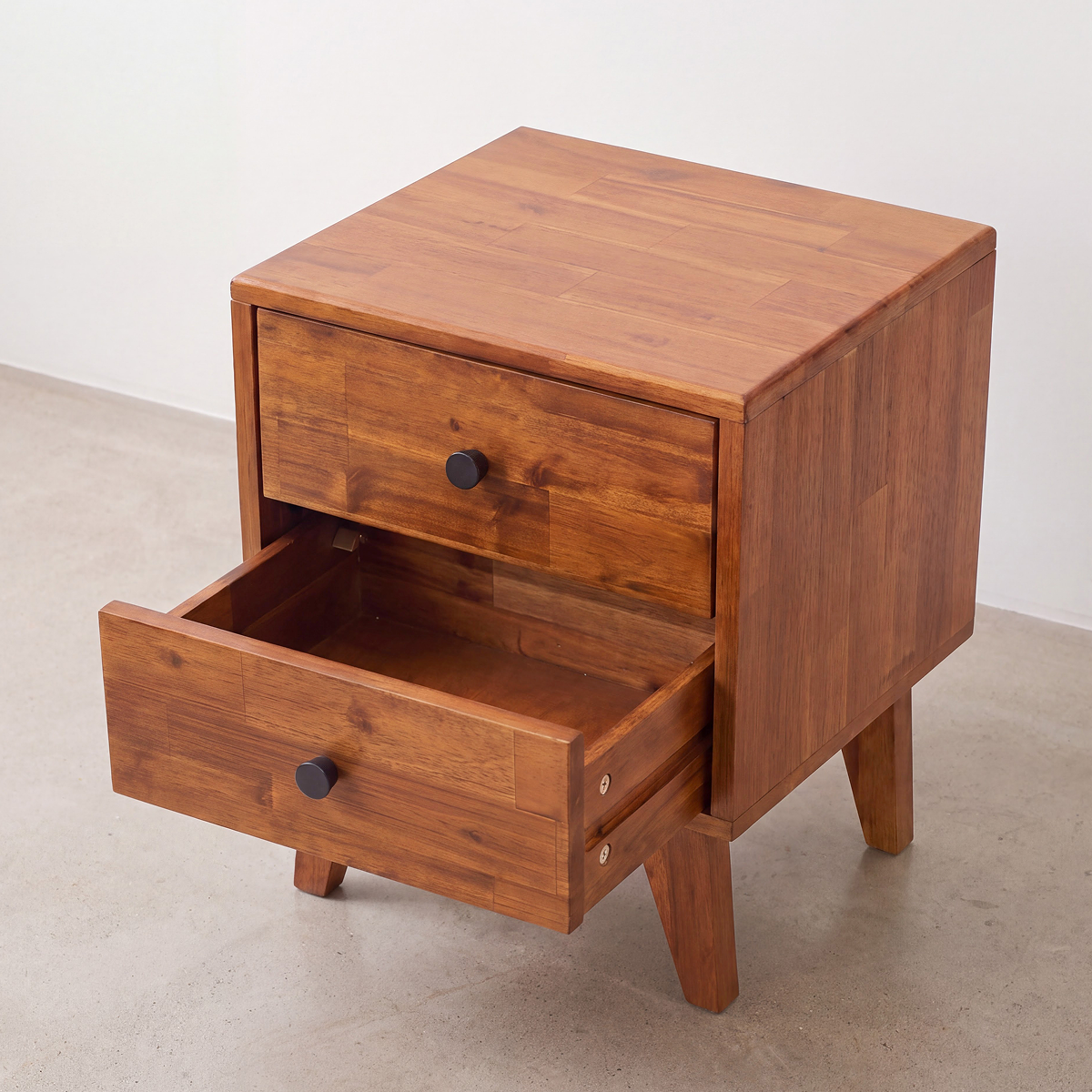 Silvia solid wood nightstand with one drawer open, showing interior storage
