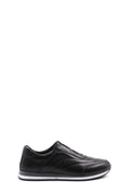Black leather low-top sneakers with contrast white sole, side profile.