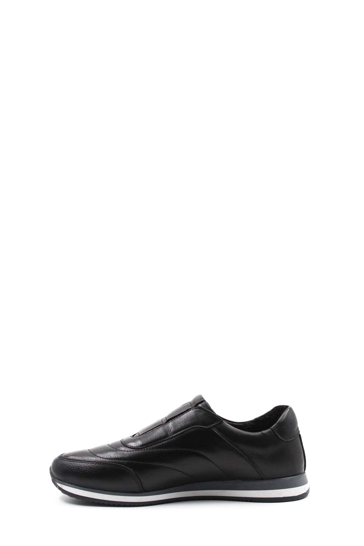 Black leather low-top sneakers with contrast sole, front three-quarter view.