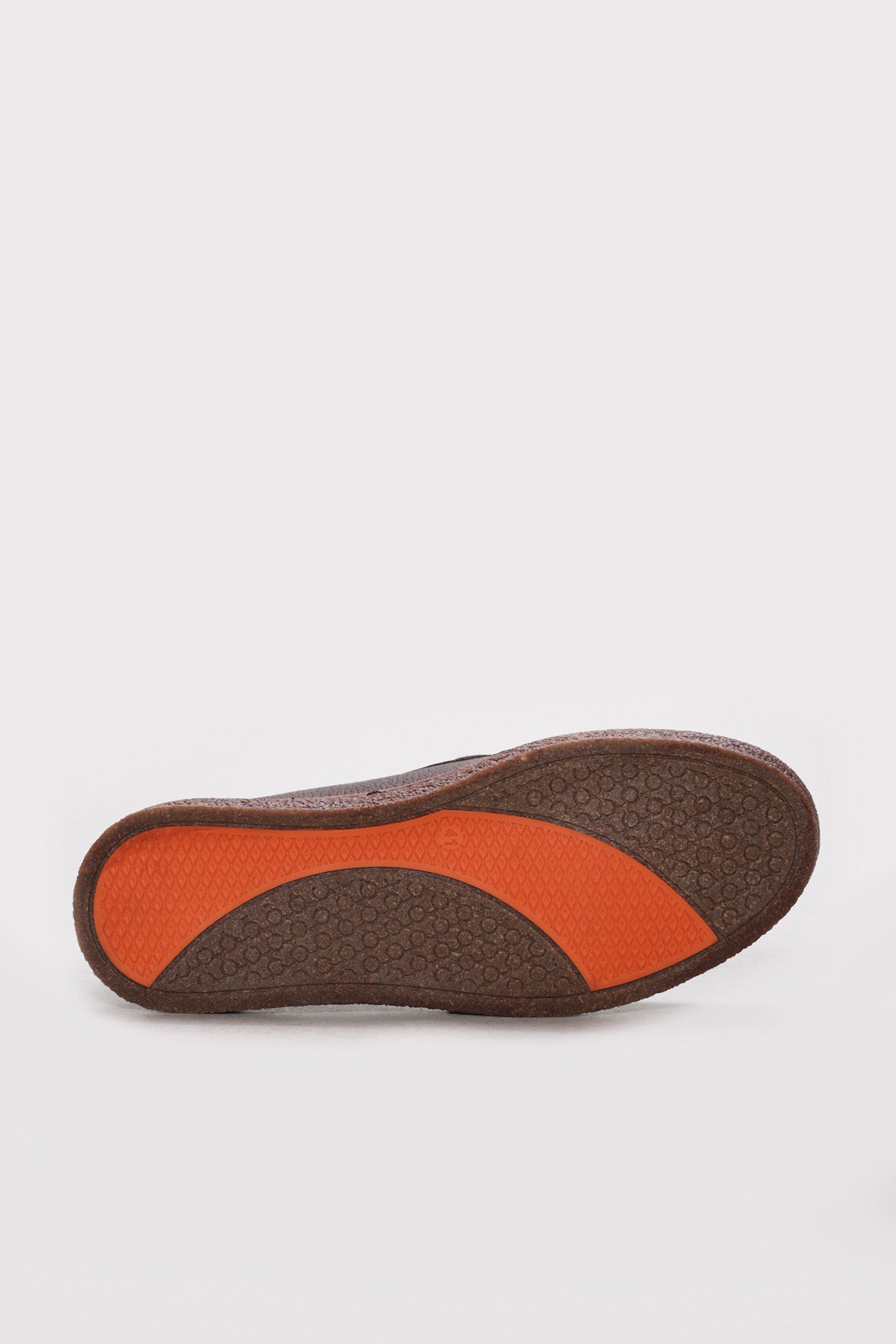 Men's dark brown casual shoes outsole with patterned tread and orange panels