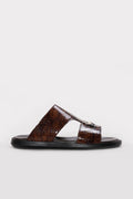 Brown reptile-textured leather double-band slides with black sole, open toe