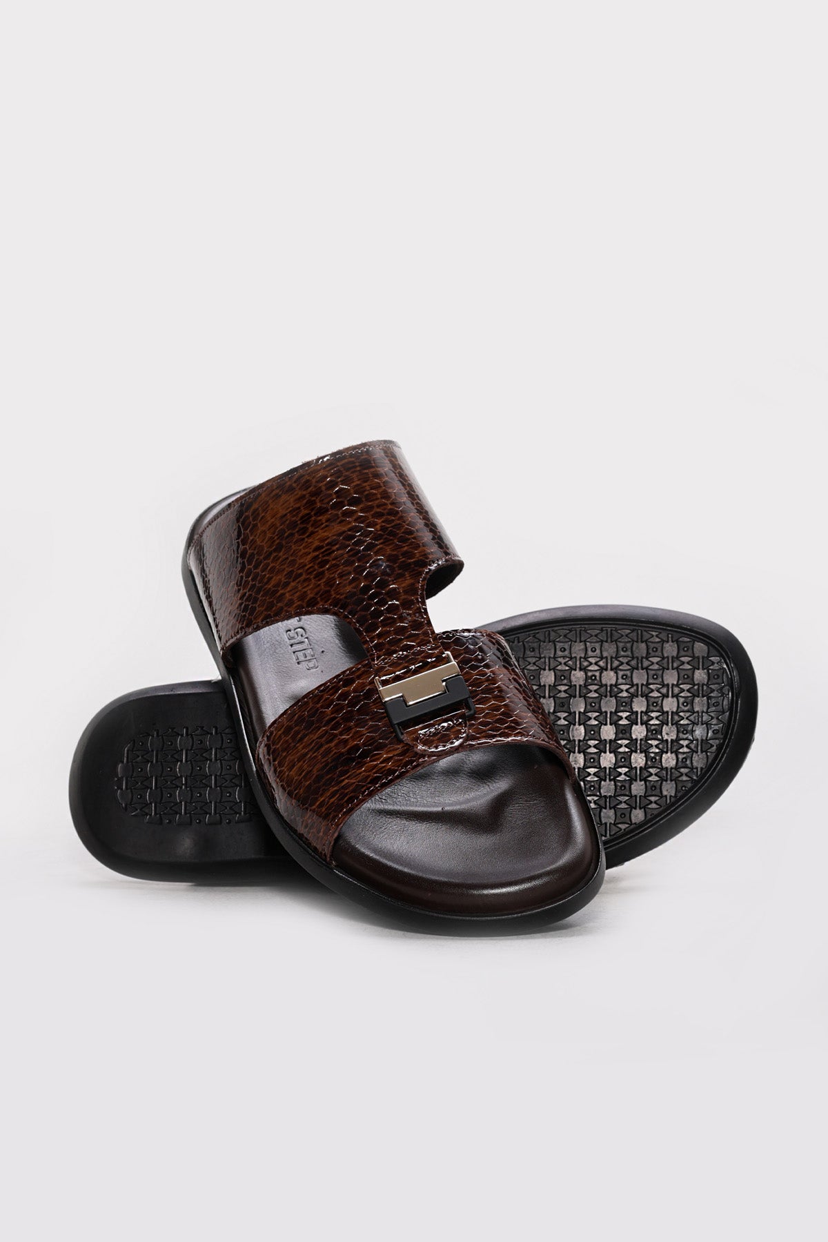 Brown reptile-textured leather double-band slide sandal with black patterned footbed