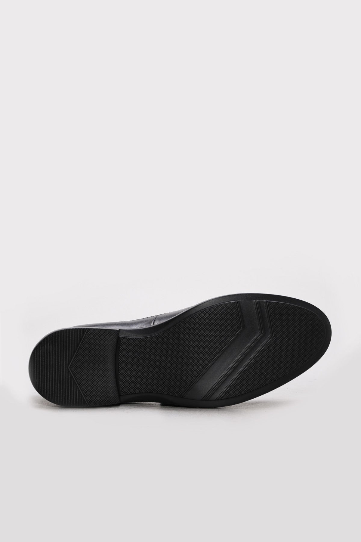 Men's black leather dress shoe outsole, flat sole with tread pattern