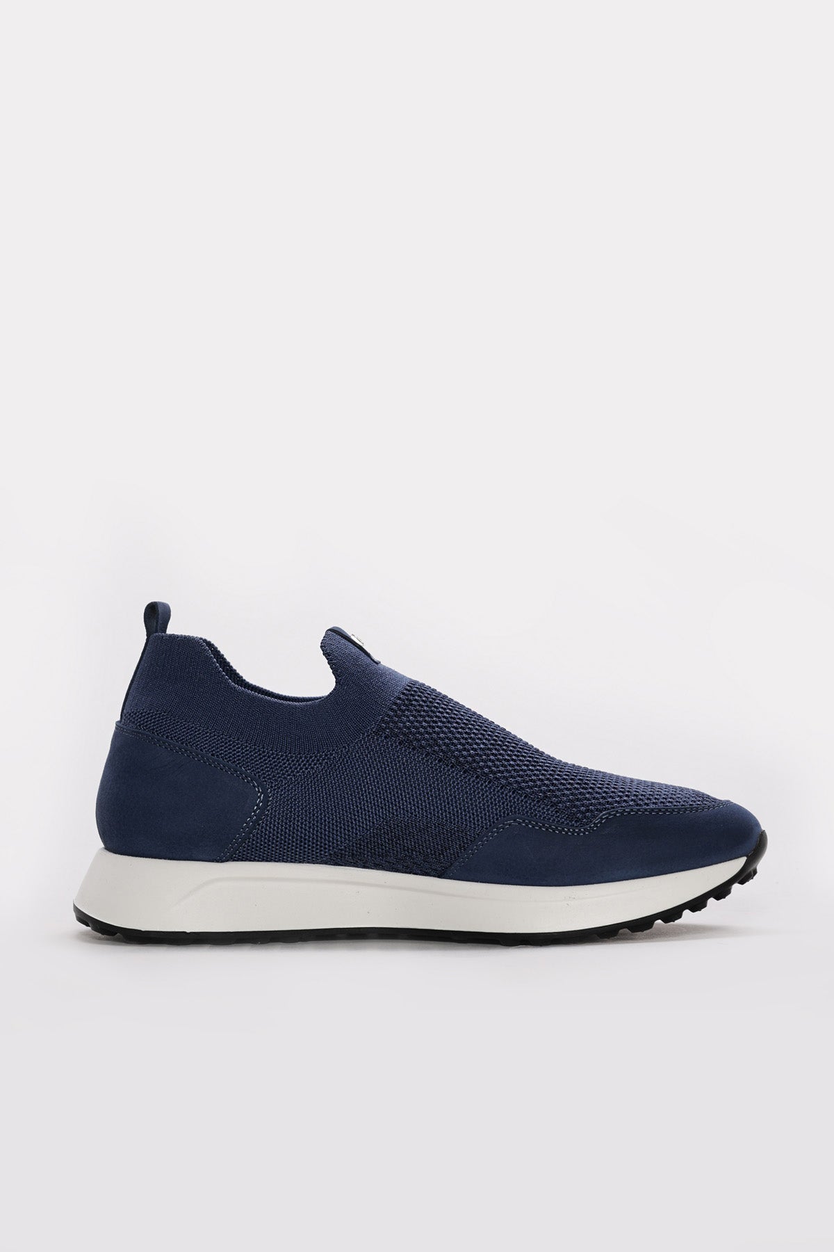 Blue textured leather slip-on sneakers with stretch collar and white rubber sole