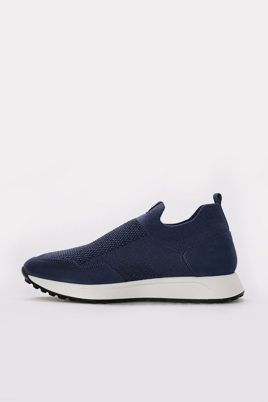 Blue slip-on sneaker with textured upper and low white midsole
