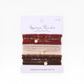 Set of braided hair tie bracelets with gold-tone charms, in red, pink, and brown