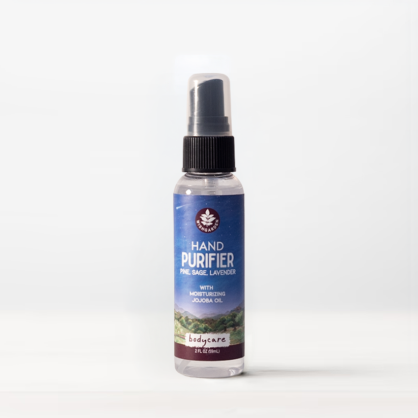 Hand purifier spray bottle with blue label and dark pump top