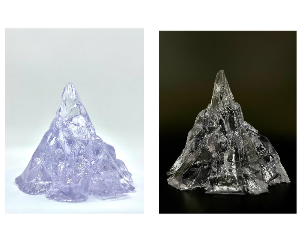 Iceberg-shaped jelly wax candles set in two colors, unlit, crystal-faceted wax