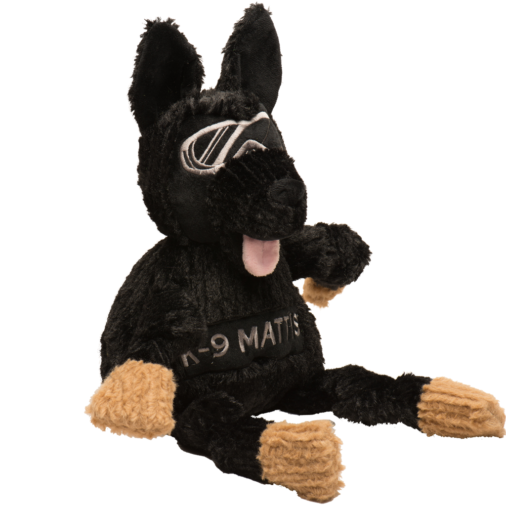 Sitting black plush German shepherd dog toy with tan paws, pink tongue, and K-9 MATTIS shirt
