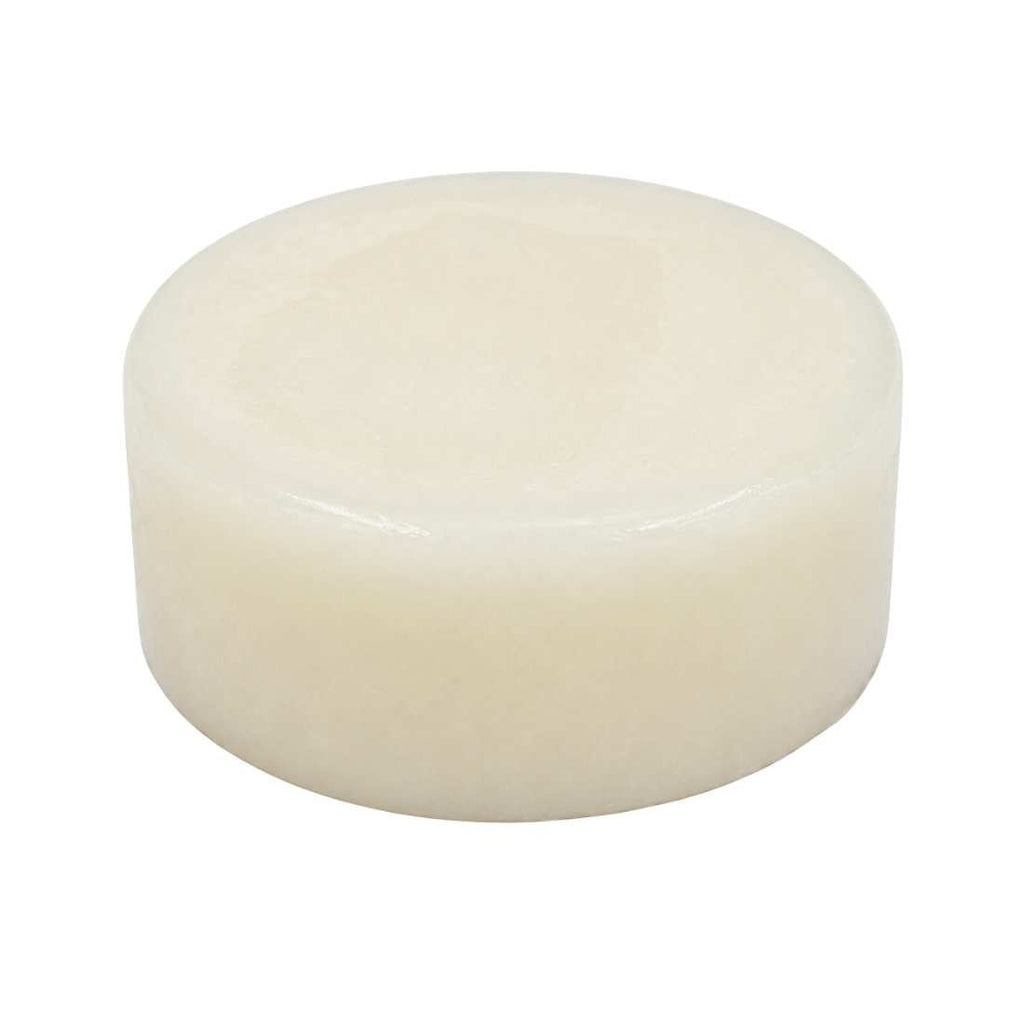 Tallow shave soap puck, smooth cream-colored round