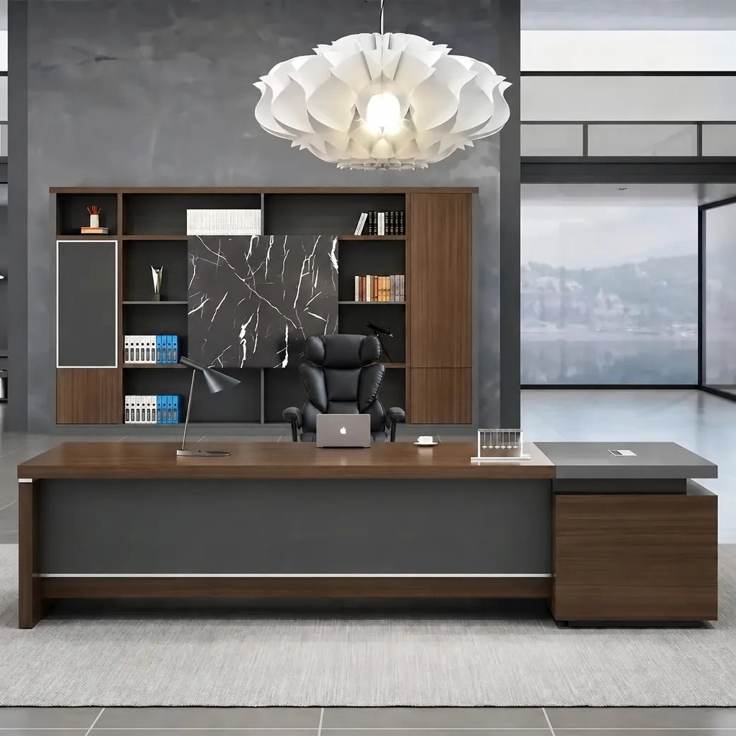 Dark oak L-shaped executive desk with gray desktop and built-in shelving return