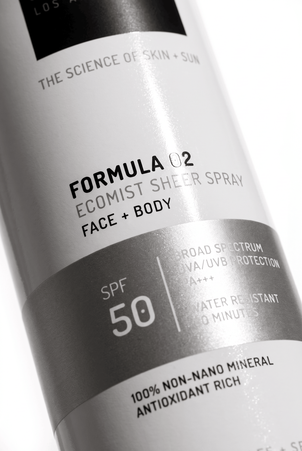 Ecomist Formula 02 face + body sheer spray SPF 50 label close-up