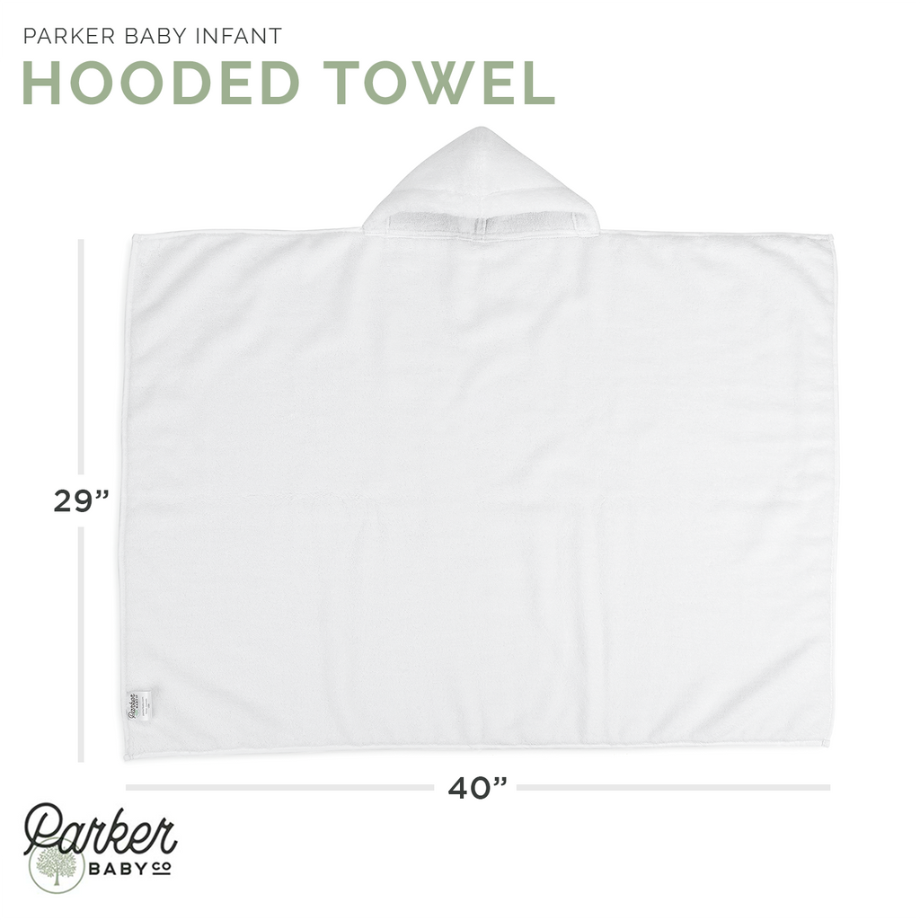 White hooded bath towel laid flat with hood at the top edge