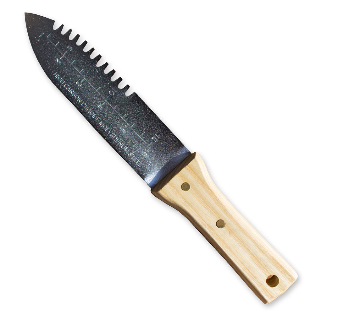 Hori Hori digging tool close-up with serrated blade and light wooden handle