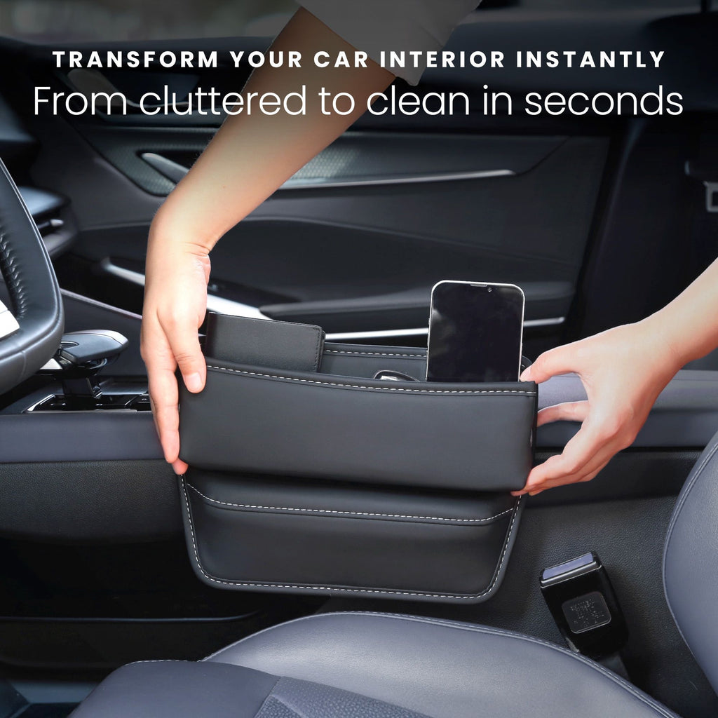 Black car seat organizer pocket holding a smartphone, with stitched seams