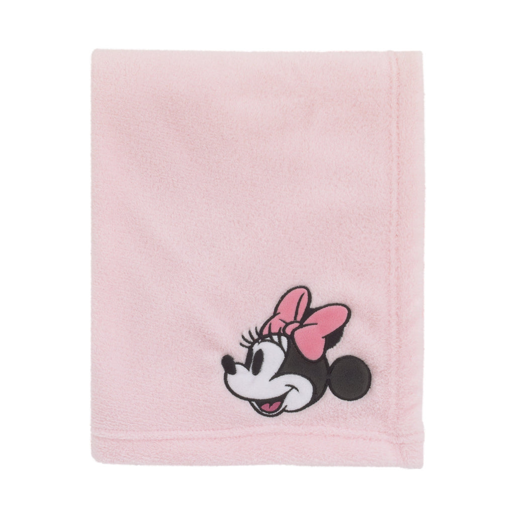 Pink baby blanket with embroidered Minnie Mouse face and bow