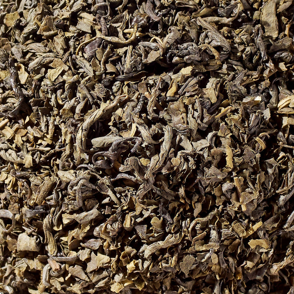 Loose Chunmee green tea leaves in a close-up view