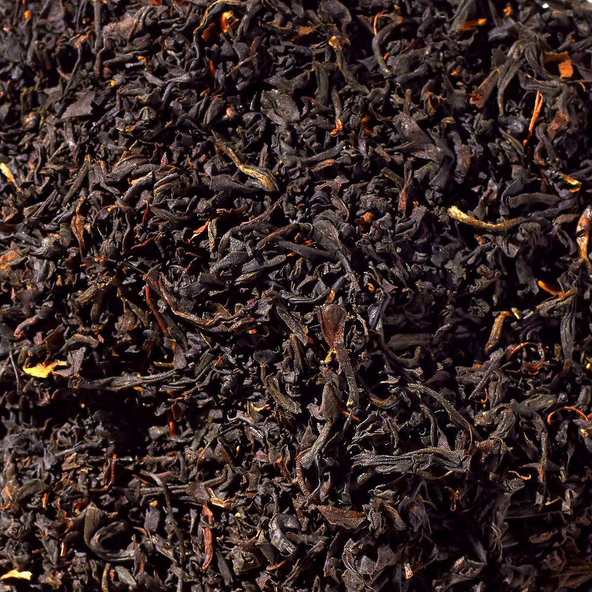 Kenyan No. 13 loose black tea leaves in a close-up view