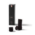 Kenyan No. 13 black tea box displayed with several pressed tea discs