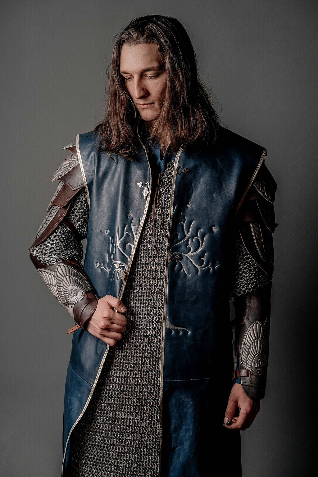 Blue tunic with silver tree embroidery and chainmail-style textured chest panel